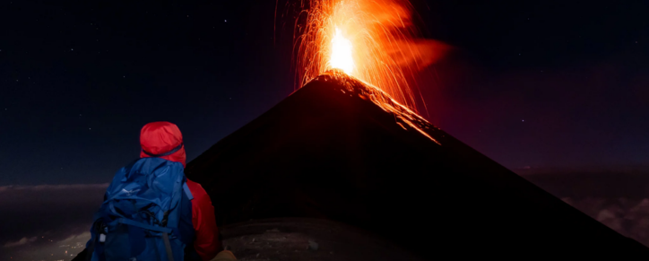Hikers ascending Acatenango volcano trail through cloud forest near Antigua Guatemala — overnight guided tour with Cyman Travel