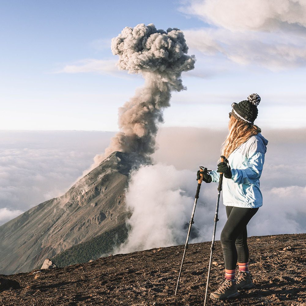 Panoramic view from Acatenango base camp at 3600 meters with Fuego volcano and Guatemala valley below — Cyman Travel guided tour