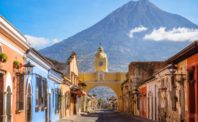 Antigua Guatemala colonial city with Volcán de Agua in the background during dry season clear skies
