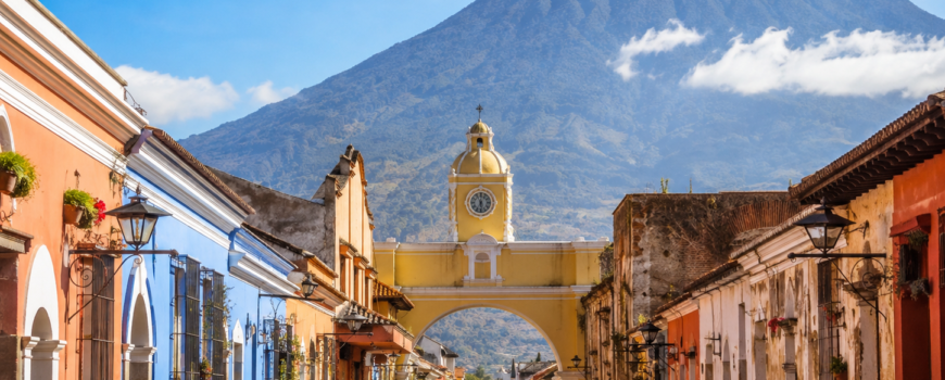 Antigua Guatemala colonial city with Volcán de Agua in the background during dry season clear skies